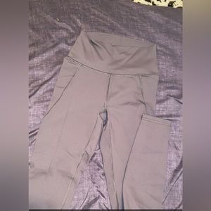grayish/brown athletic tights